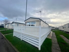Sited static caravan for sale with full wrap decking - double glazed and heated