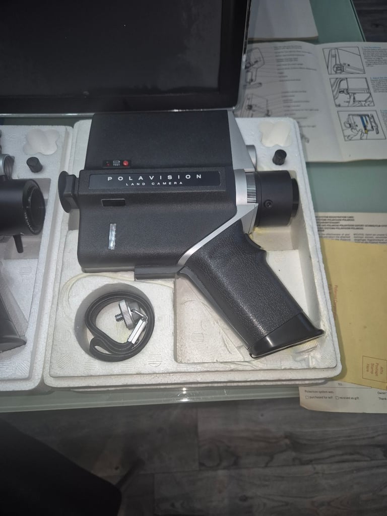 Polaroid land cameras and player screen
