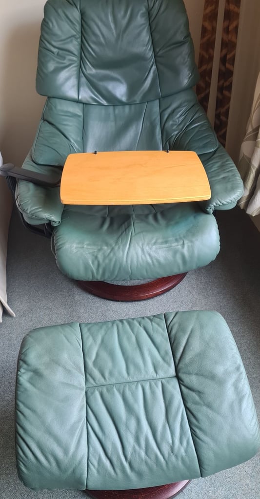 image for Stressless leather reclining swivel chair with swivel lap table and footstool.