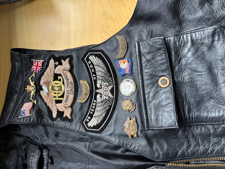LEATHER WAISTCOAT WITH BADGES