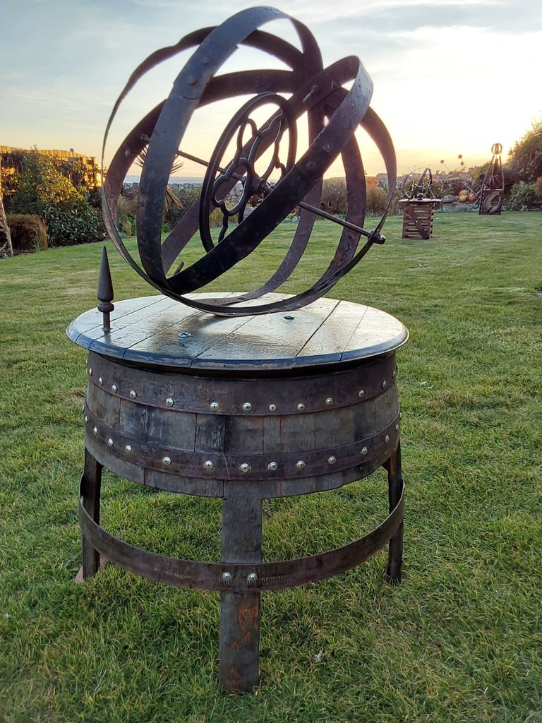 Garden art from whisky barrel materials 