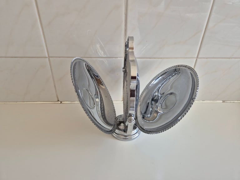Folding Cake stand, chrome/tin. with 2 leaf shaped serving dishes. £10.00. lincoln