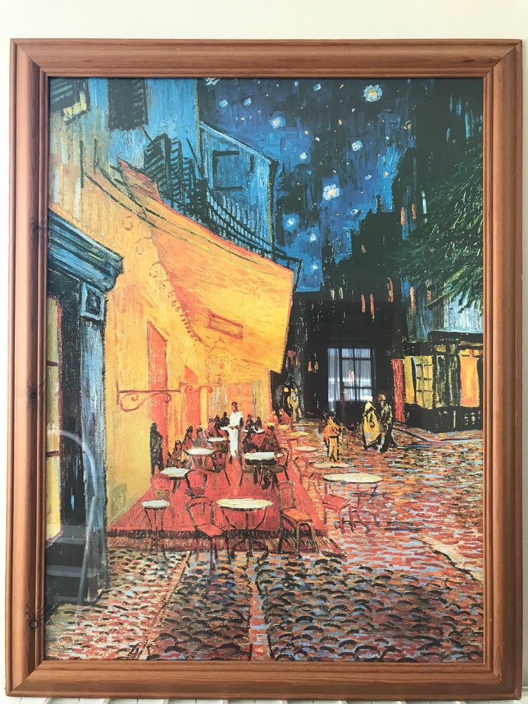 Framed print of 'Cafe Terrace at Night' by van Gogh.