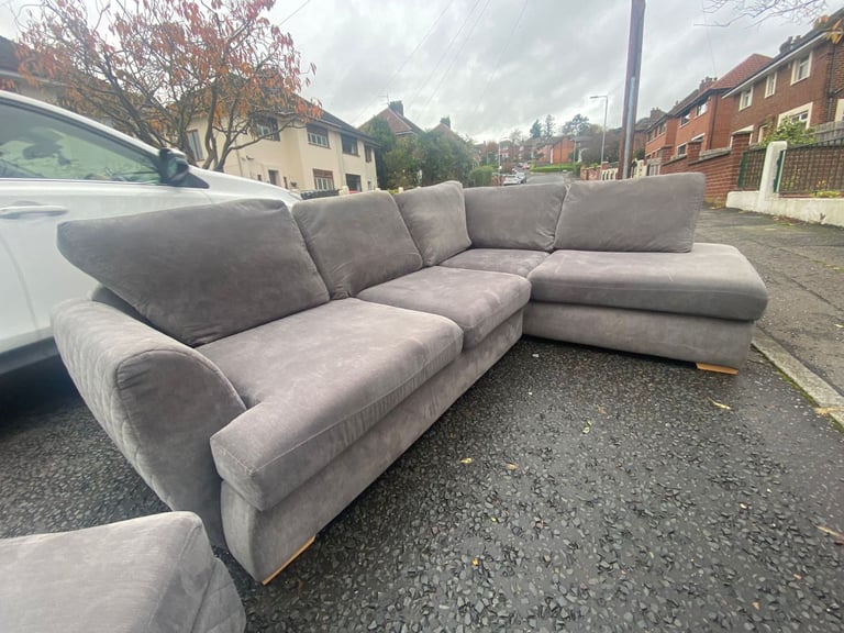 Corner group sofa in a quilted fabric with matching ottoman footstool   Only £199