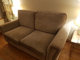 Two seater cream sofa