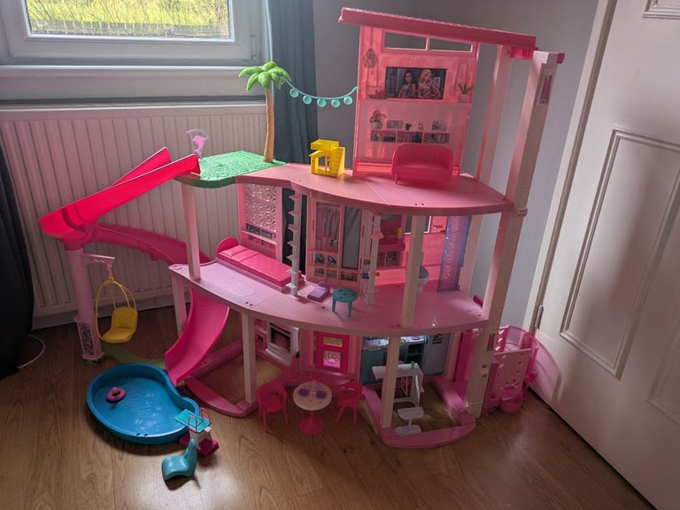 image for Barbie bundle with dreamhouse, ambulance, Speedboat & Wardrobe