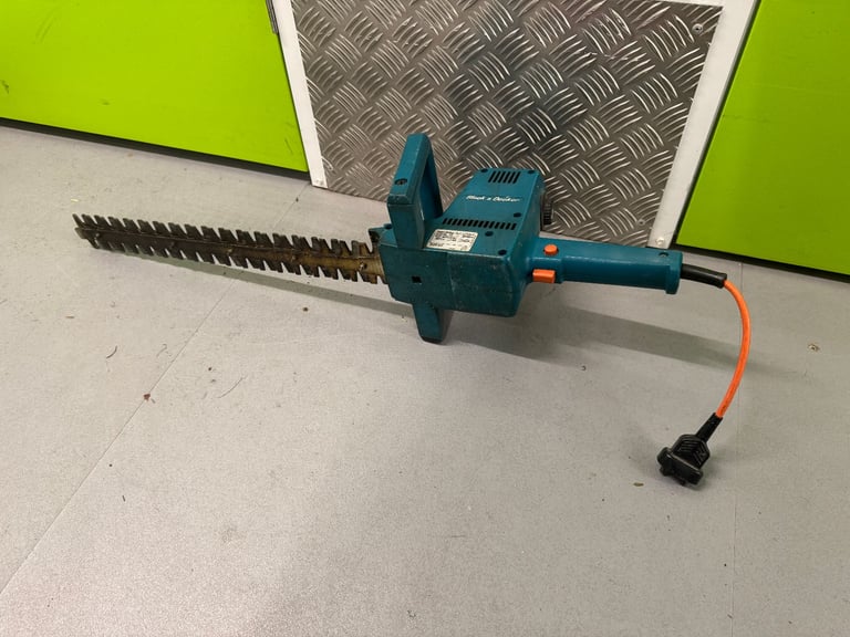 Black and Decker 16 inch 405mm electric hedge trimmer with long cord.