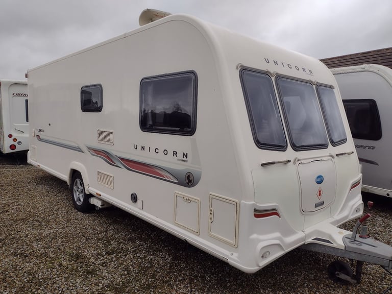 Bailey unicorn Valencia 2012 caravan fixed bed motor mover awning 