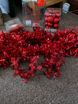 Assorted red Christmas decorations 