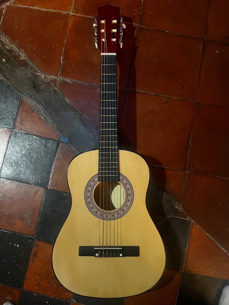 Children’s guitar with carry case
