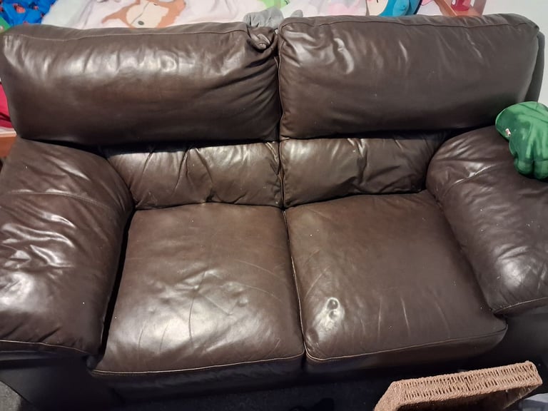 Free 2  seater leather couch 