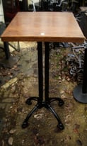 FOURTEEN CAST IRON TALL PUB POSEUR TABLES WITH WOODEN TOPS: - MICROPUB, HOME BAR, MAN OR WOMAN CAVE