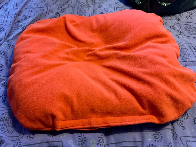 Pet beanbag in orange fleece. 