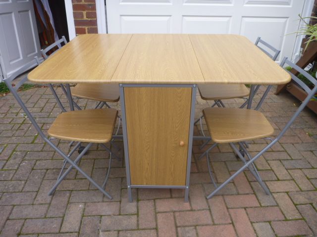 image for Space Saving Butterfly Table & 4 Chairs As New