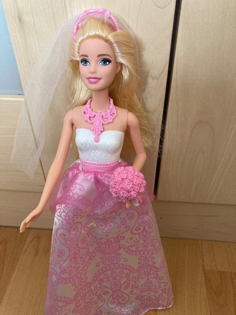2 x Barbie dolls with accessories
