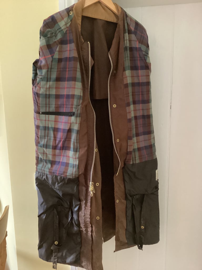 Waxed riding coat with cape