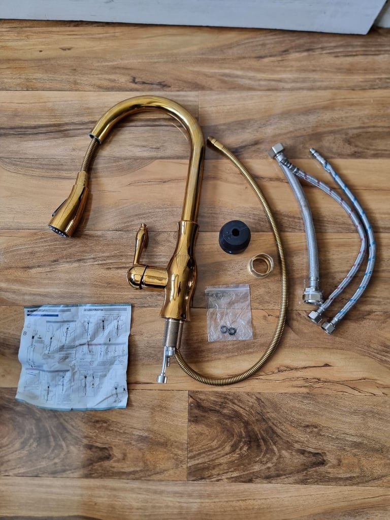 image for GOLD MIXER TAP UNUSED BUT HAS MARKS DUE TO STORAGE £40ono, INSTRUCTIONS INCLUDED
