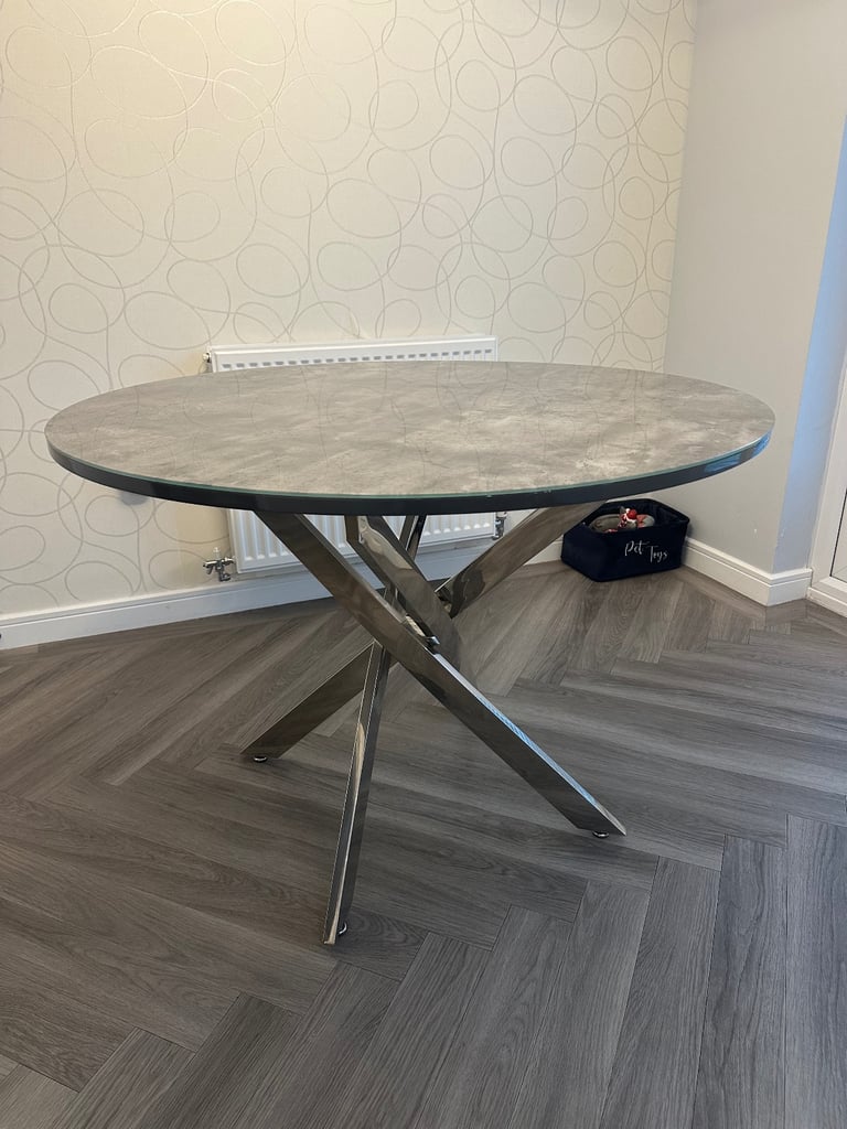 Grey marble effect glass top dining table with chrome legs and 4 grey suede dining chairs 