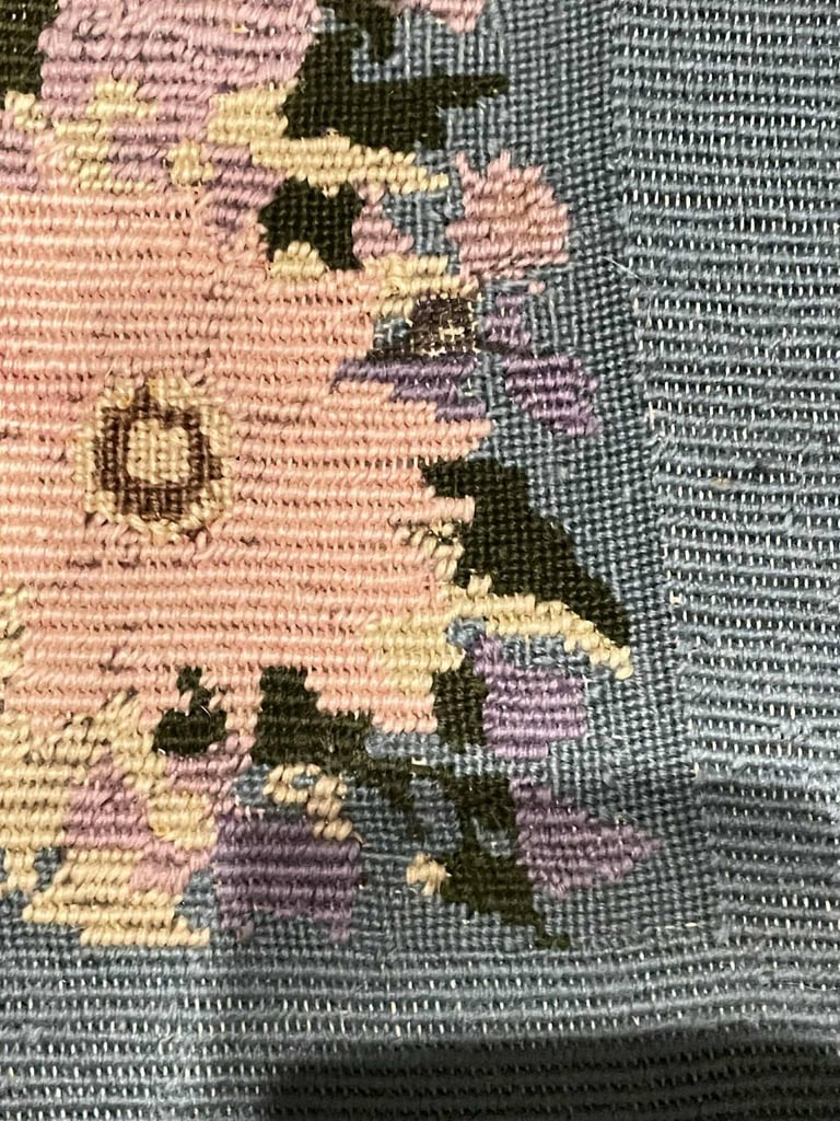 Lovely Antique Bobbin Corner Chair with a fabric embroidered top.