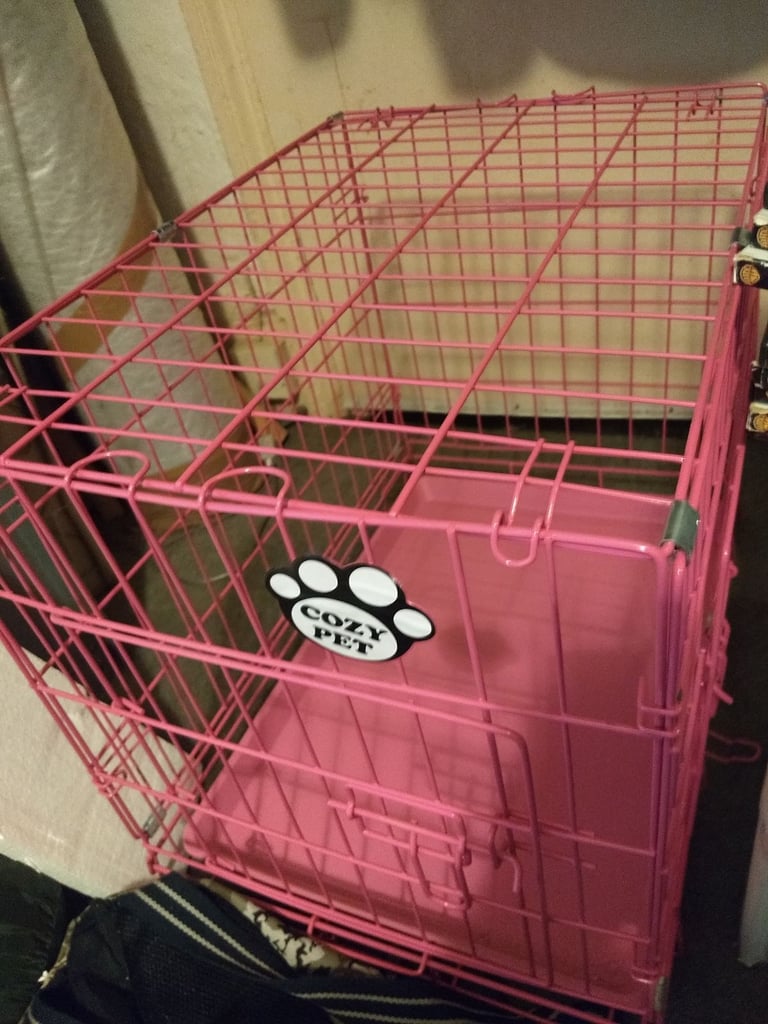 Cozy pet 24 inch dog/pet crate. Pink colour.