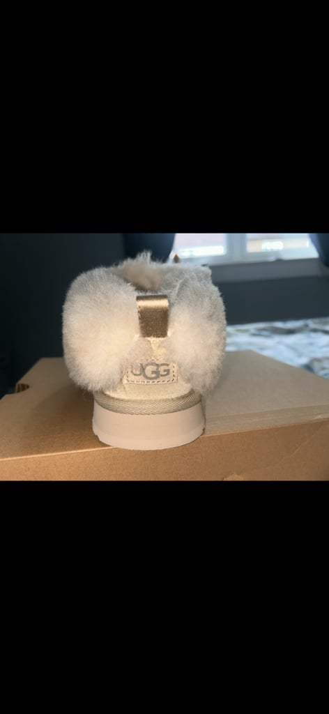 Ugg slippers brand new in the box never been worn 