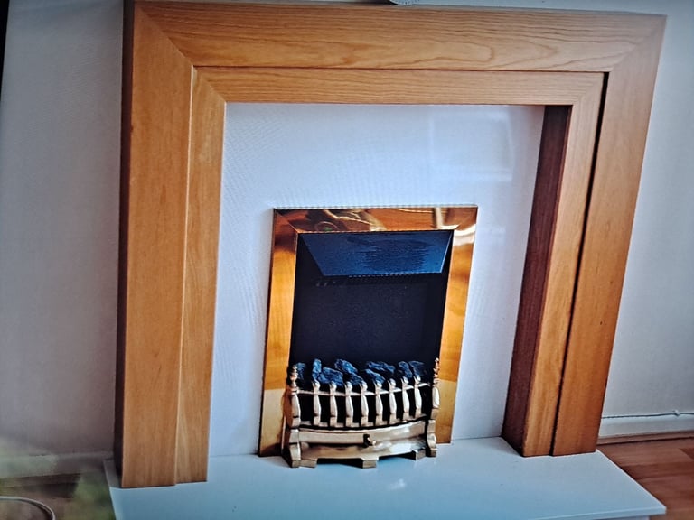 Fireplace in oak and cream.