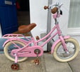 Kids bicycle. Pink bike.