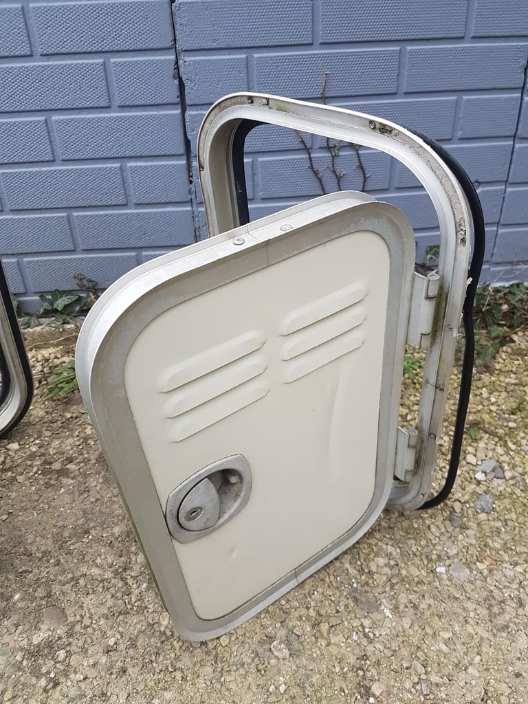 Various side doors with frames and keys for caravan camper motorhome - gas, toilet, storage.