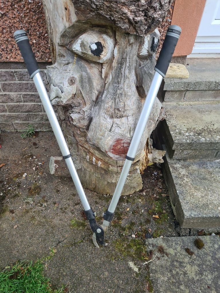 Garden tools snow shovel leaf rake loppers hoe