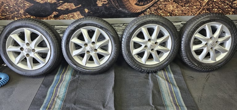 Toyota Genuine 14 alloy wheels + 4 x tyres 155 65 14 Continental