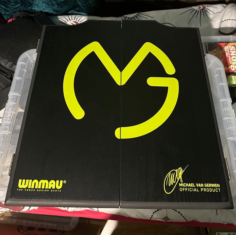 (Brand New) WINMAU Michael Van Gerwen MVG Dartboard With Cabinet, Darts and Accessories