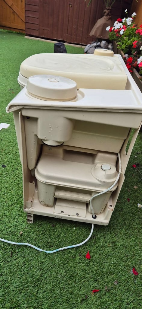 Whole complete toilet unit for camper conversion.