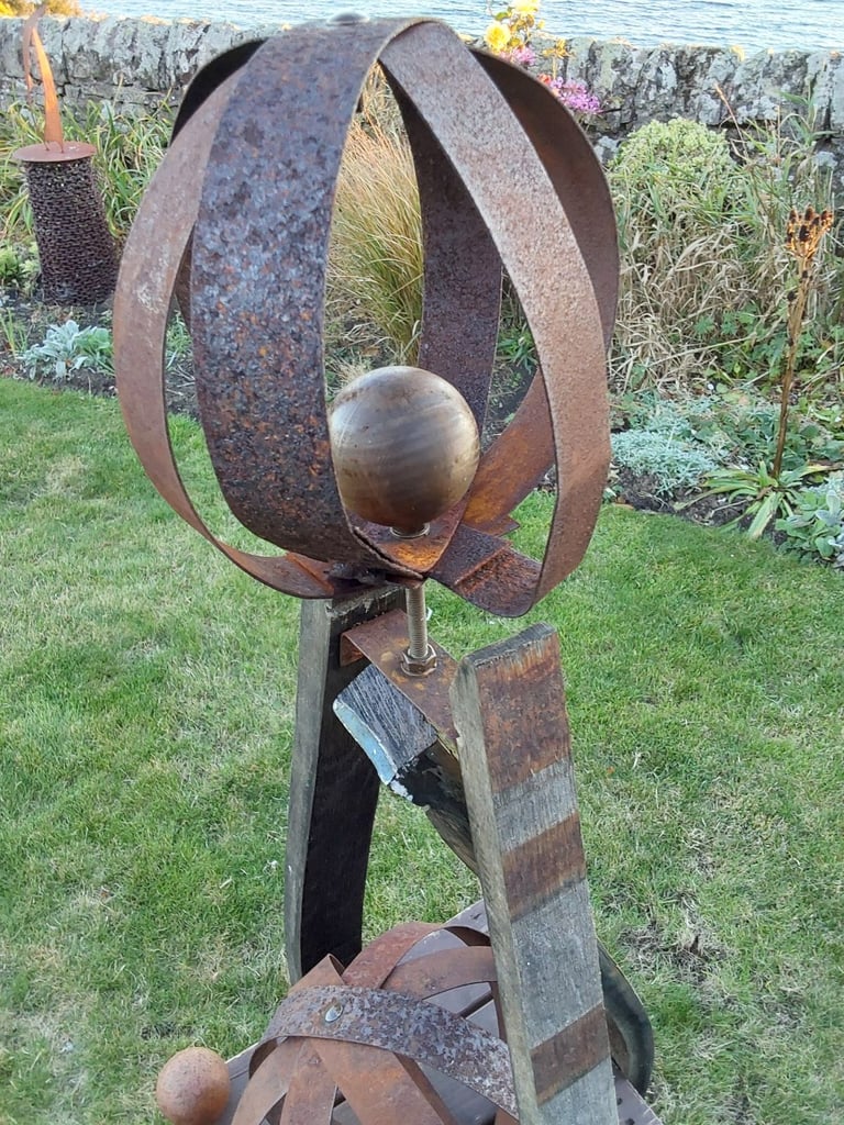 Garden art from whisky barrel materials 