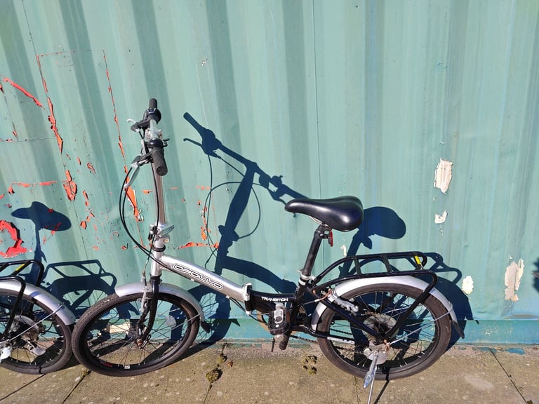 Apollo Transition folding bikes with bags