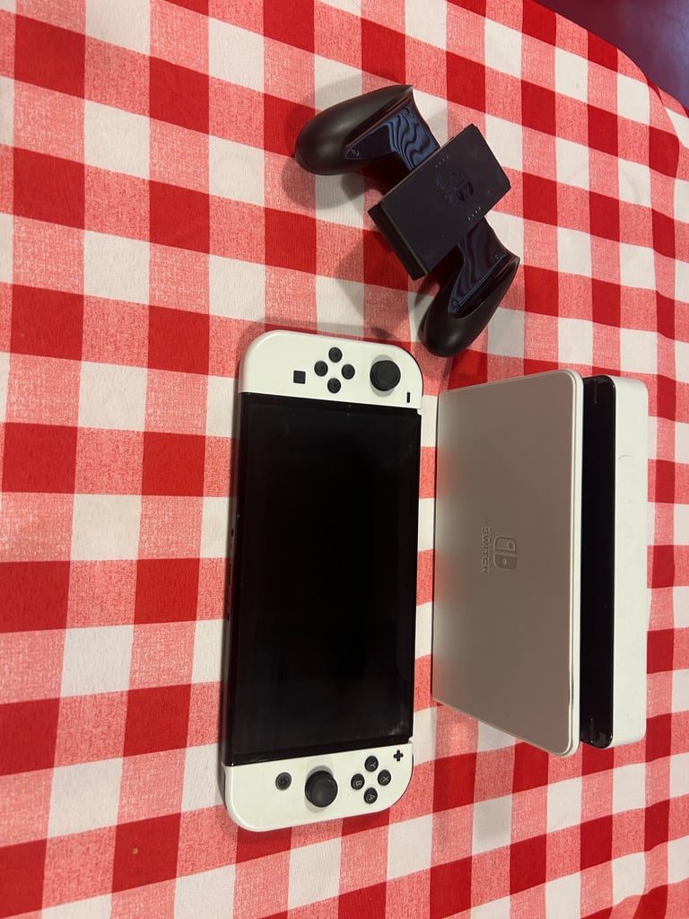 image for Oled Nintendo switch and charger 