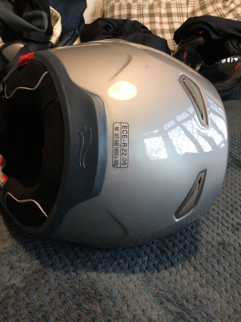 Flip up crash helmet