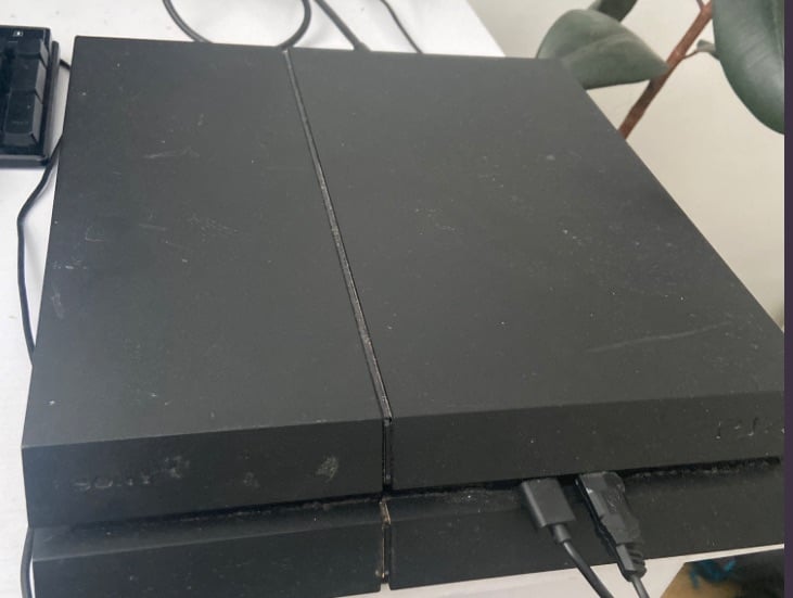 PlayStation 4 with one controller 