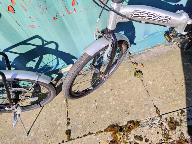 Apollo Transition folding bikes with bags