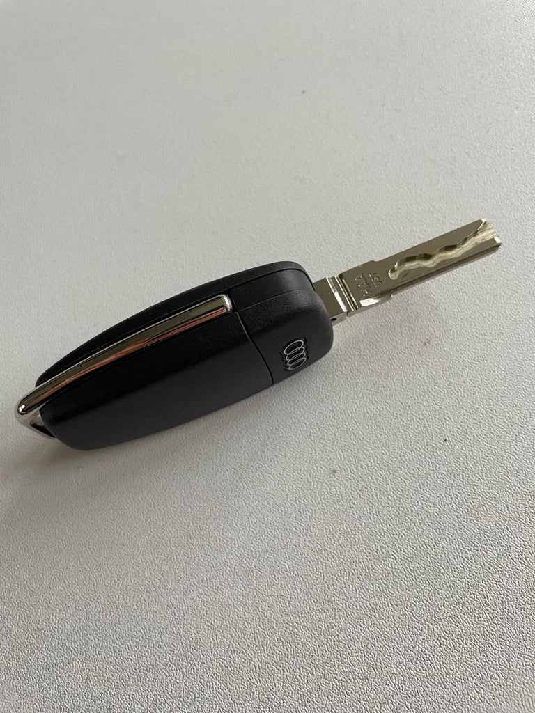 Original Audi 3 button car key. 