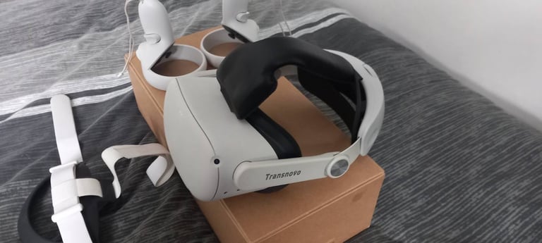image for Meta Quest with controllers and 2 head straps