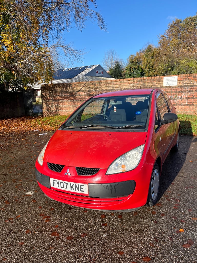 Mitsubishi colt 2007 red 3 door low miles 6 months mot, some history cheap tax and insurance