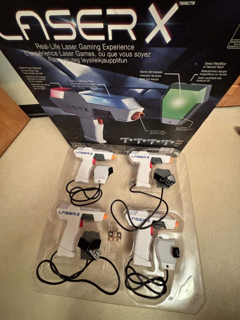 Laser X 4 Micro Blasters, 2 never used, excellent condition with box and batteries