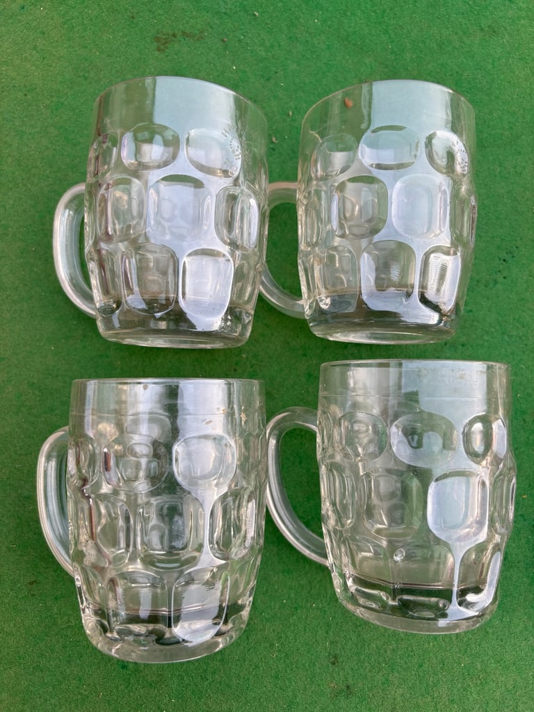 Mixed lot of half pint handled glasses some vintage 