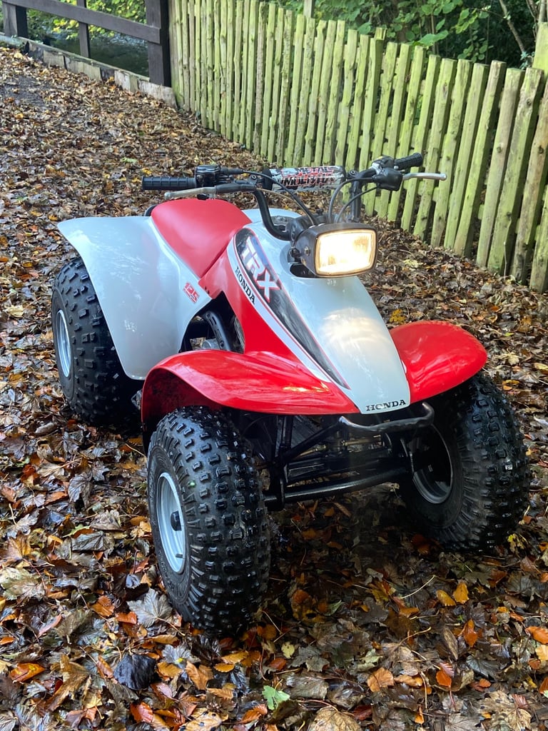 Honda trx 125 quad bike big red