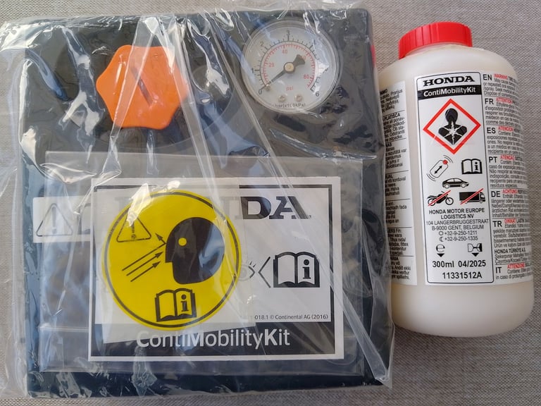 image for Genuine Honda Tyre Inflation Kit Air Pump Compressor and fluid Bargain £20