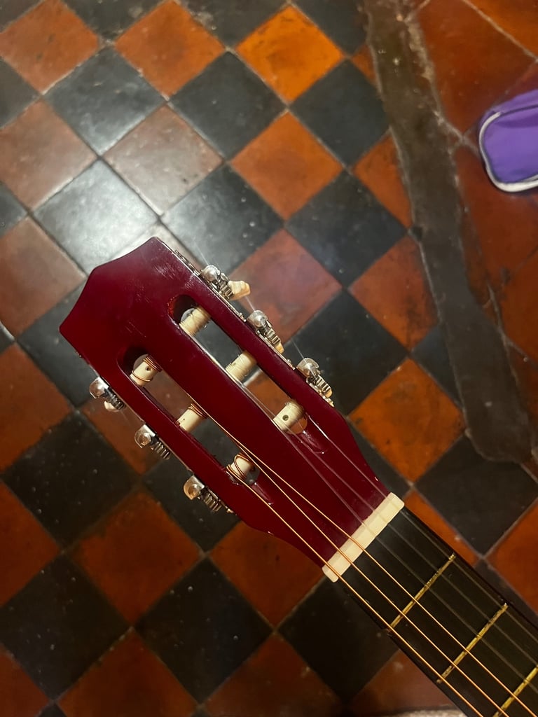 Children’s guitar with carry case