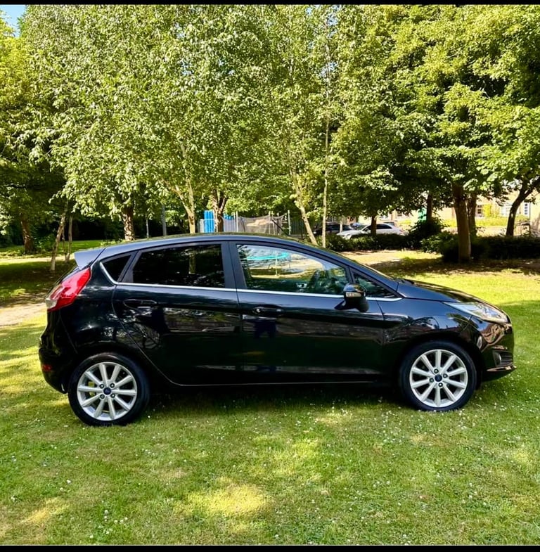 Ford fiesta titanium 1.5 diesel black 5 door 65 reg 70k miles bargain price may px 