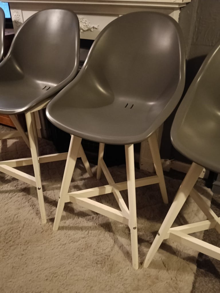 Four IKEA fanbyn bar stools