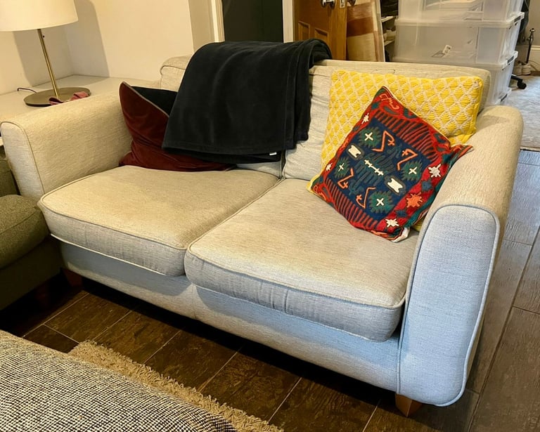 COMFY AND GOOD QUALITY TW0 SEATER SOFA AND ARMCHAIR FOR SALE. Pick up this weekend.