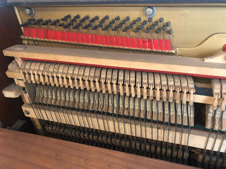 Upright Piano by Stanley Brinsmead London, 7 Octaves, 88 keys, dark wood.  Good condition.